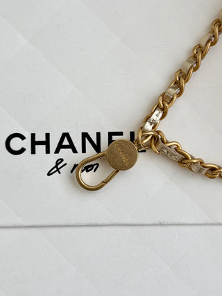 Chanel 25A ultra-mini cf pendant bag, gold color.
