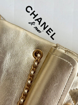 Chanel 25A ultra-mini cf pendant bag, gold color.