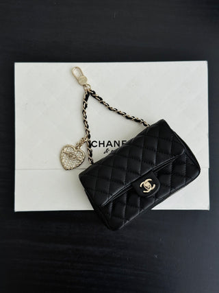 Chanel 25A ultra-mini CF hang-on bag, black.
