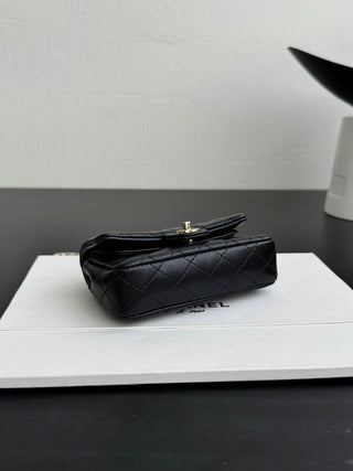 Chanel 25A ultra-mini CF hang-on bag, black.