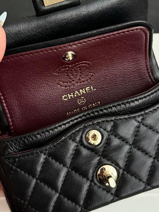 Chanel 25A ultra-mini CF hang-on bag, black.