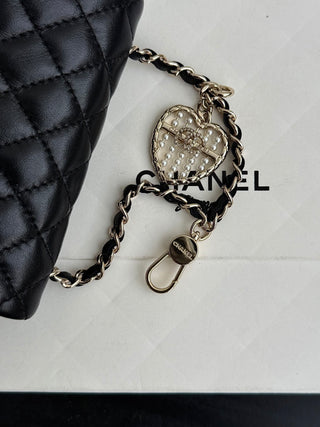 Chanel 25A ultra-mini CF hang-on bag, black.