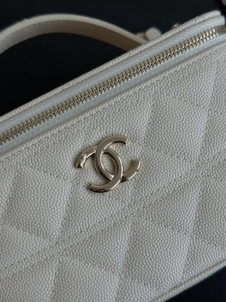 CHANEL 25C Box Bag, gray-white color.